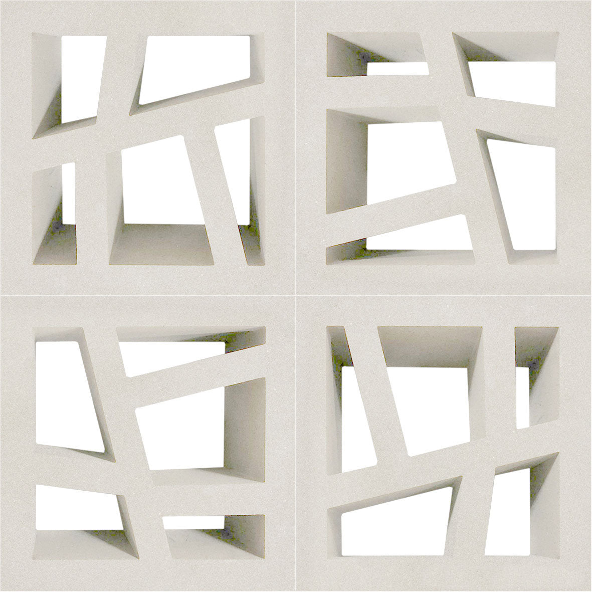 Four white Kyush Sample blocks by New York Cement Tile form a 2x2 grid, resembling a mid-century concrete screen.