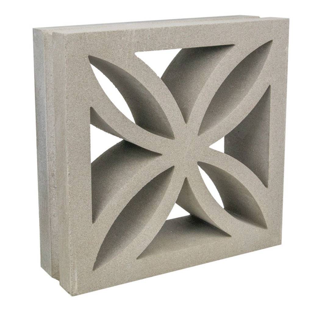 The Large Beeza Sample by New York Cement Tile is a square breeze block with a mid-century geometric, flower-inspired cutout.