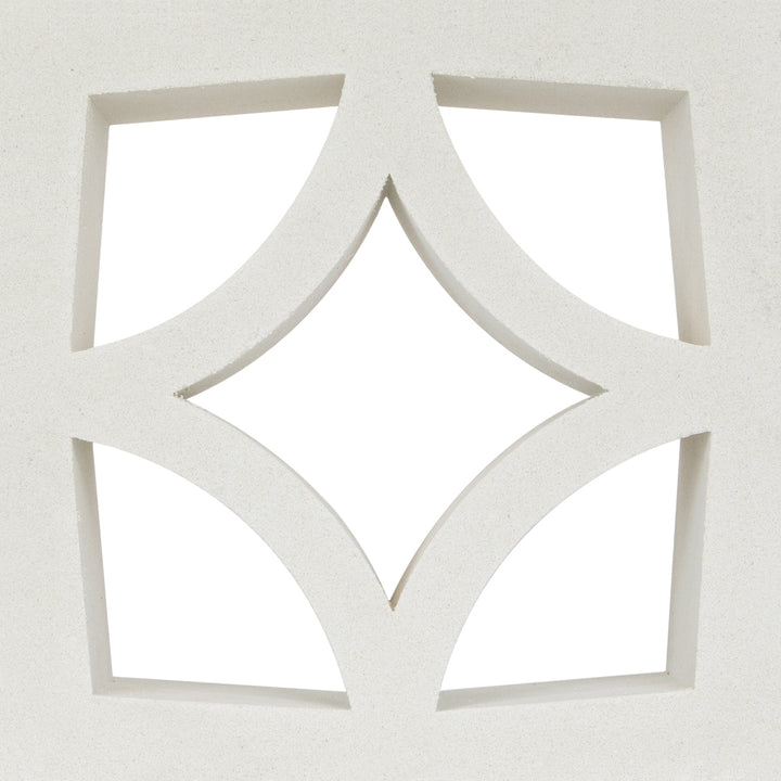 The Large Malta by New York Cement Tile is a white concrete screen with diamond-shaped openings for mid-century modern decor.