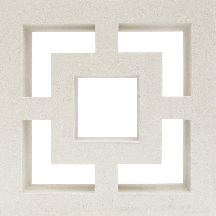 The Large Tong by New York Cement Tile is a decorative block with a square center and L-shaped cutouts, great for privacy screens.
