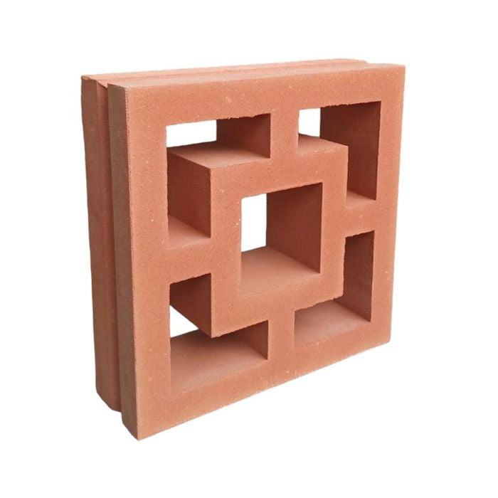The Large Tong by New York Cement Tile is a red terracotta breeze block with a geometric square pattern for privacy screens.