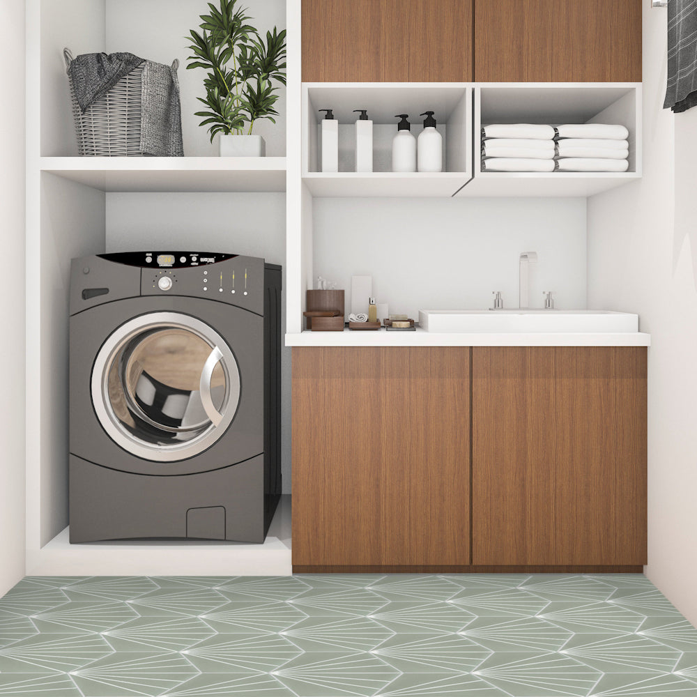 Modern laundry room with NH23-036 - 3331 tile by New York Cement Tile, washer, sink, shelves, and wood cabinets.