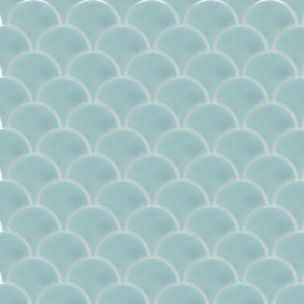 The NF20-4402 Velvet Fishscale sample by New York Cement Tile features overlapping teal scallops with white outlines.