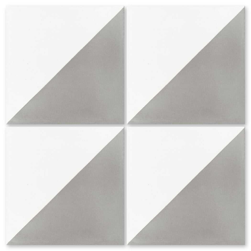 Four N20-139 Soft Slate & White tiles by New York Cement Tile form a bold geometric pattern in white and light gray.