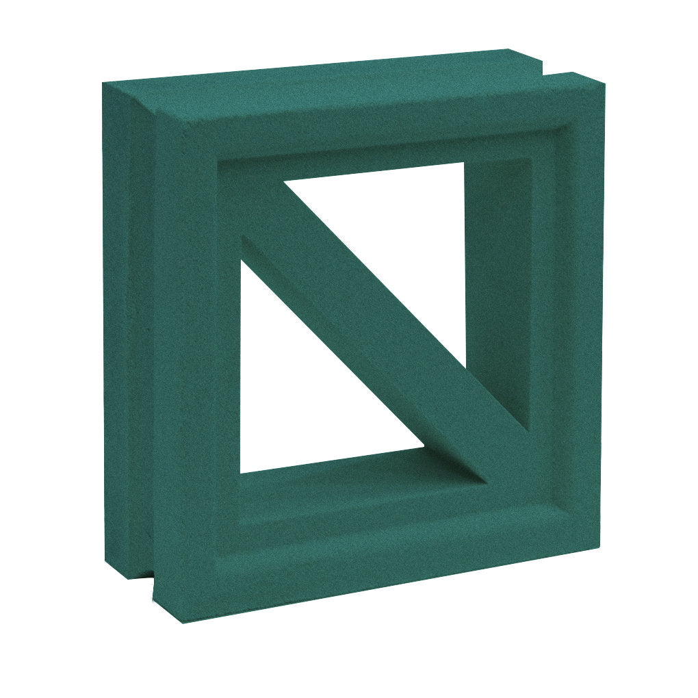 Kaui by New York Cement Tile: a green, hollow, square tile with a diagonal bar, echoing mid-century privacy screens.