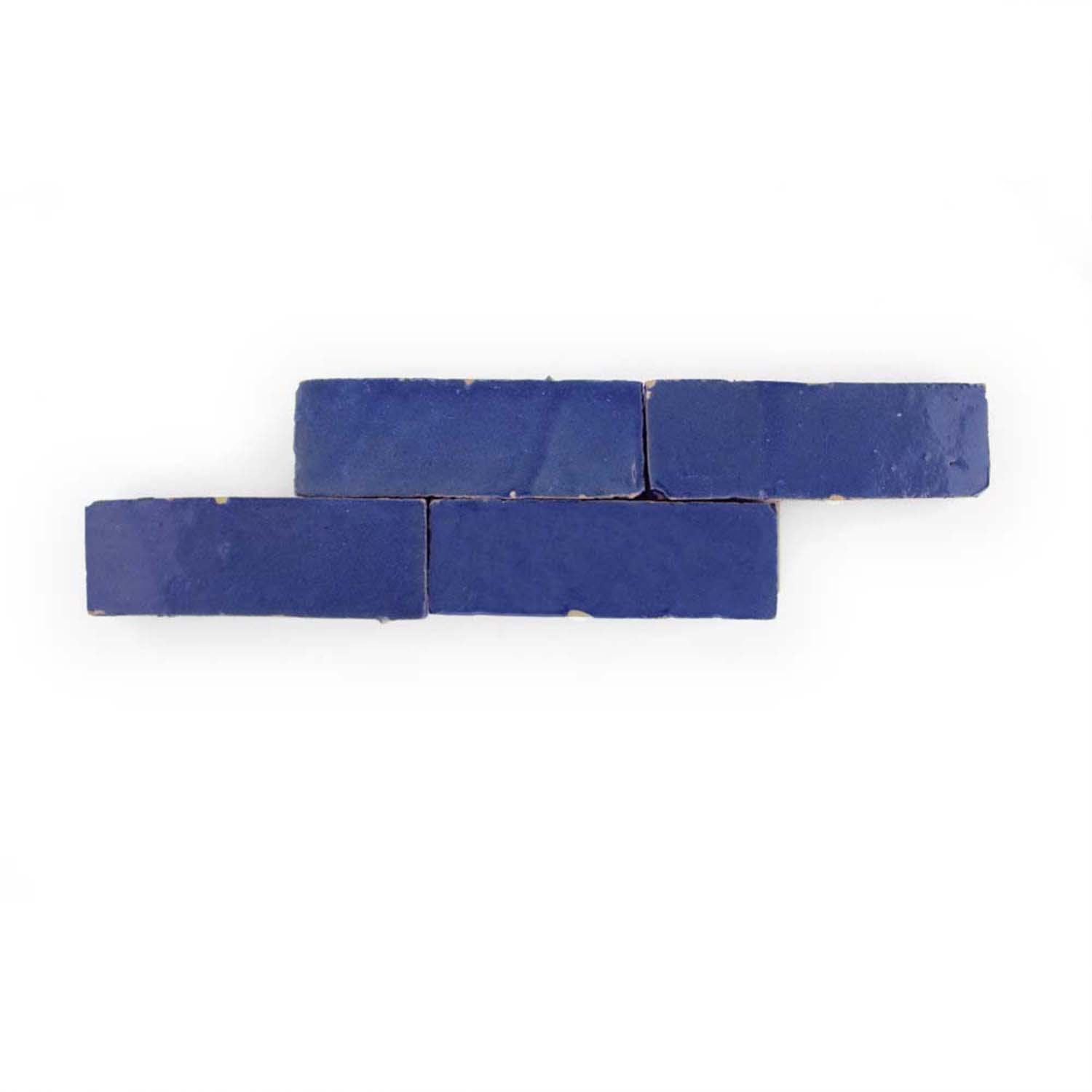 Four Navy Depths (2x6) tiles by New York Cement Tile are stacked in a staggered pattern on a white background.