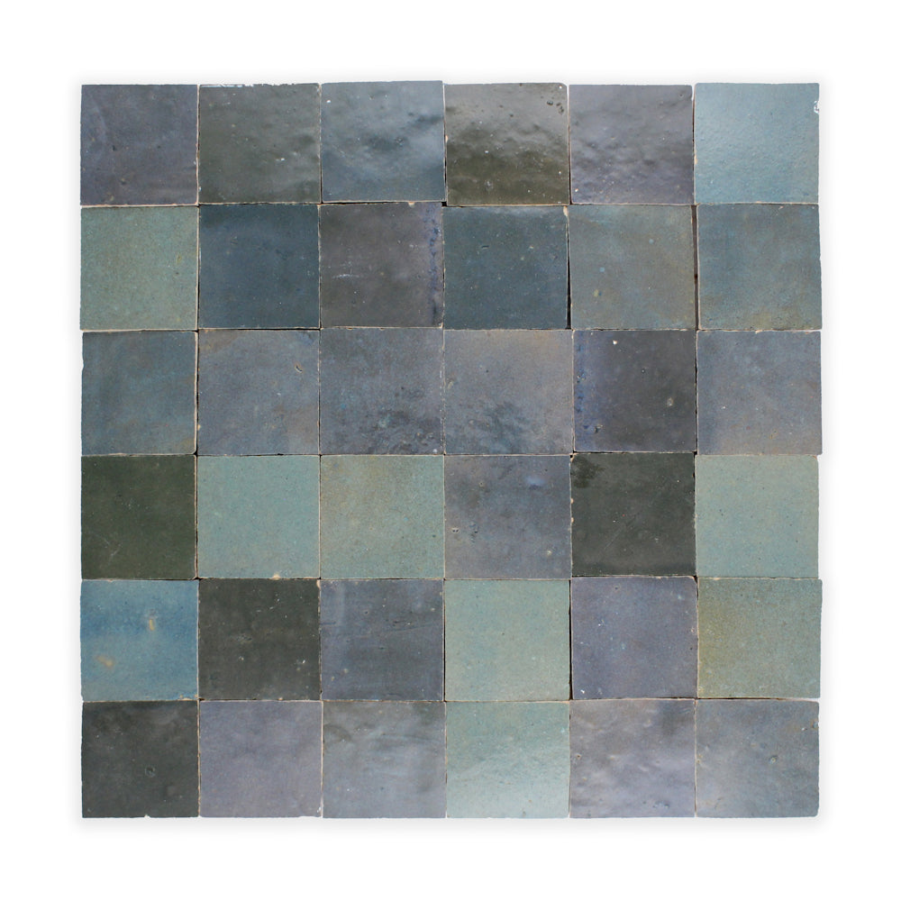 A close-up of the Deep Teal Zellige tile by New York Cement Tile, showcasing its unique handcrafted texture.