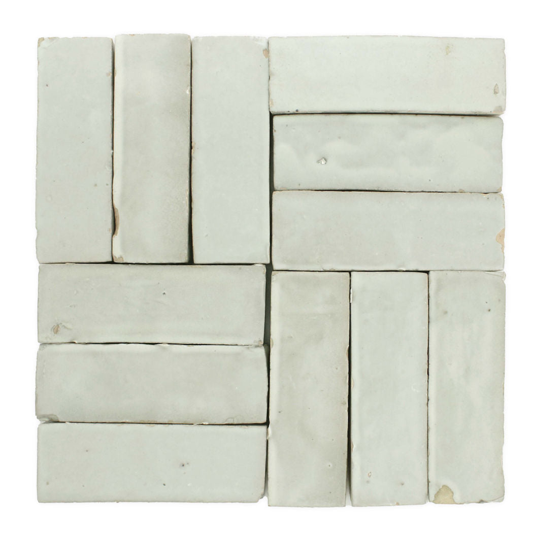 Mint Frost (2x6) by New York Cement Tile: light gray tiles in a staggered basketweave pattern on white. Extra Sample.