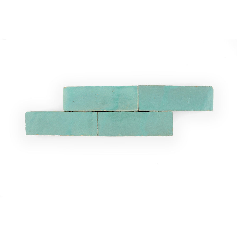 Four Seafoam (2x6) samples by New York Cement Tile, arranged in a staggered row on a white background.