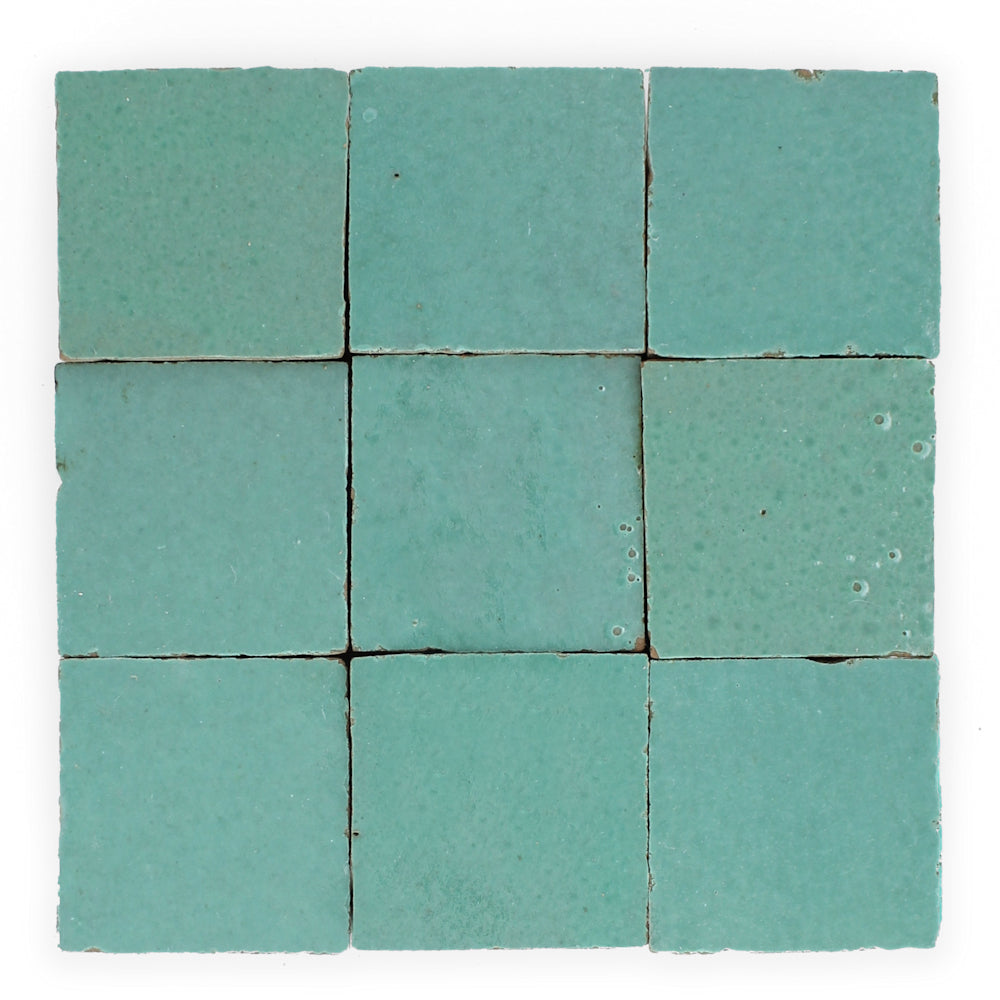 Nine Seafoam Zellige tiles by New York Cement Tile, 3x3, each handcrafted with unique textures and shades.
