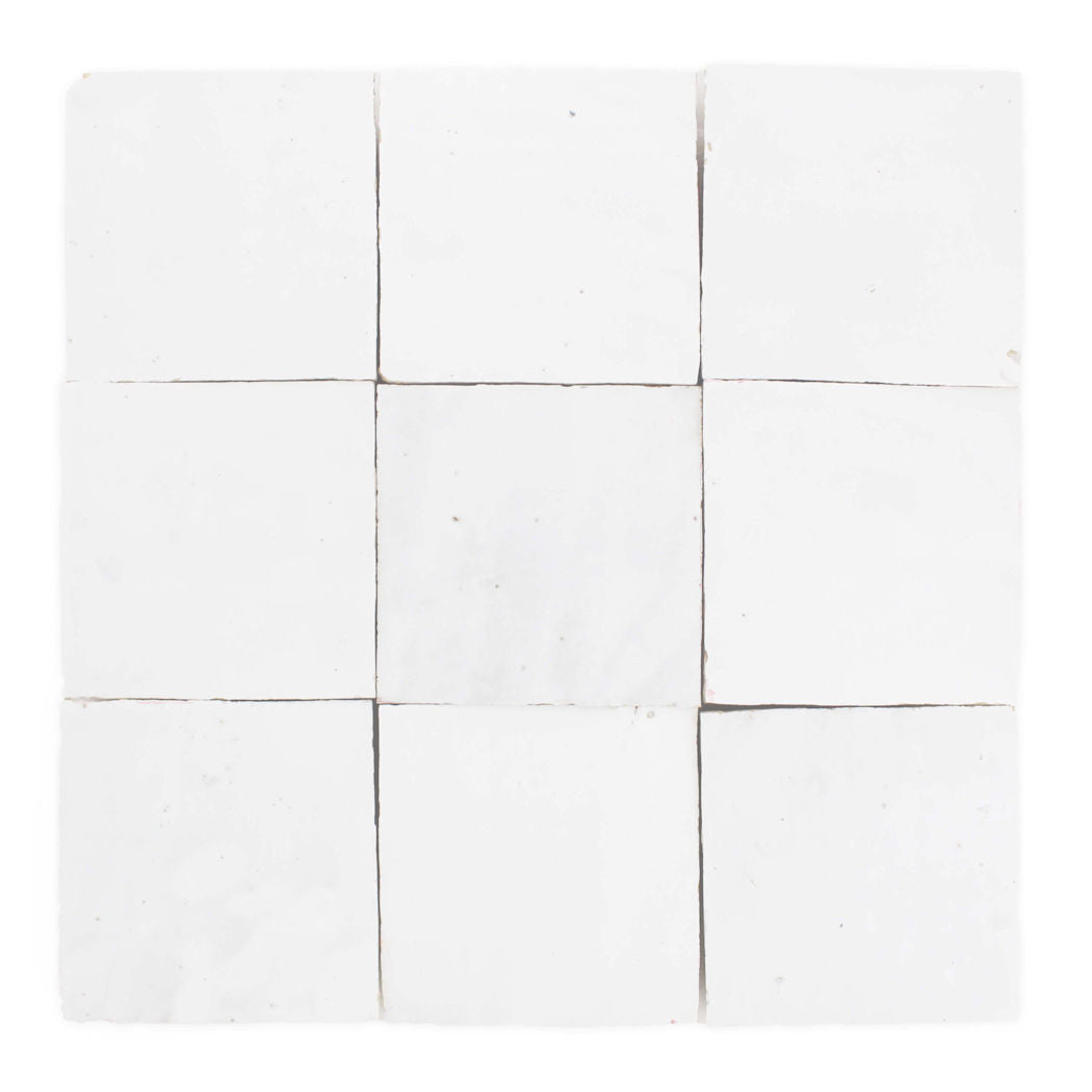 Nine Frost 2X2 tiles by New York Cement Tile, arranged in a square with visible seams and handcrafted imperfections.