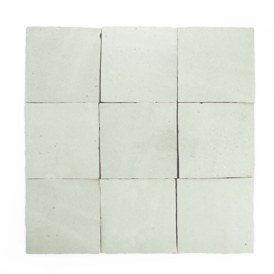 Nine Mint Frost 2X2 tiles by New York Cement Tile arranged in a 3x3 grid on a white background.