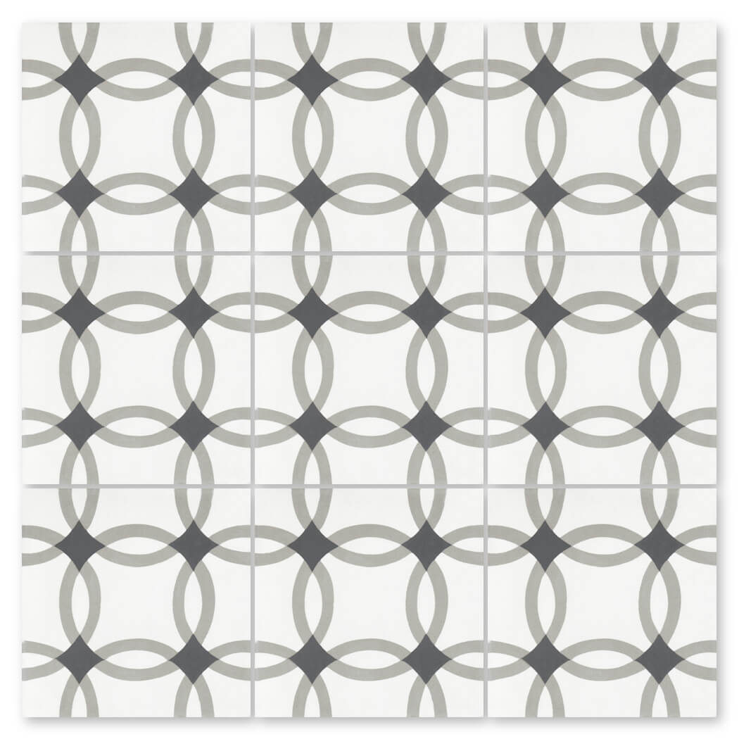 N20-255 Extra Sample by New York Cement Tile: white handcrafted tile with black and gray geometric overlapping circles.