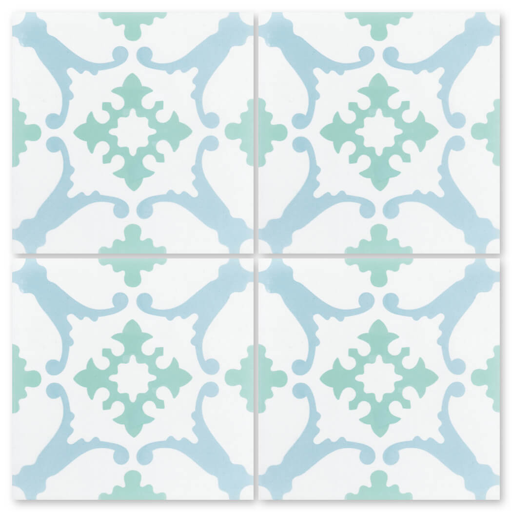 N20-148 Nassau by New York Cement Tile: blue and green geometric floral pattern on white, inspired by artisan tiles.