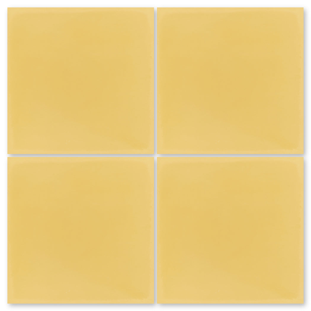 Four 7710-Solid 4x4 tiles by New York Cement Tile arranged in a two-by-two grid on a white background.