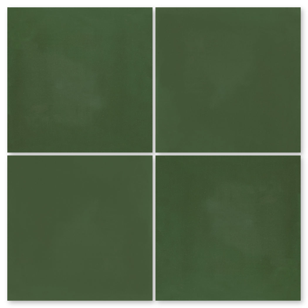 Four 4x4 dark green New York Cement Tile squares, arranged in a grid with white borders, sample 3314-Solid.
