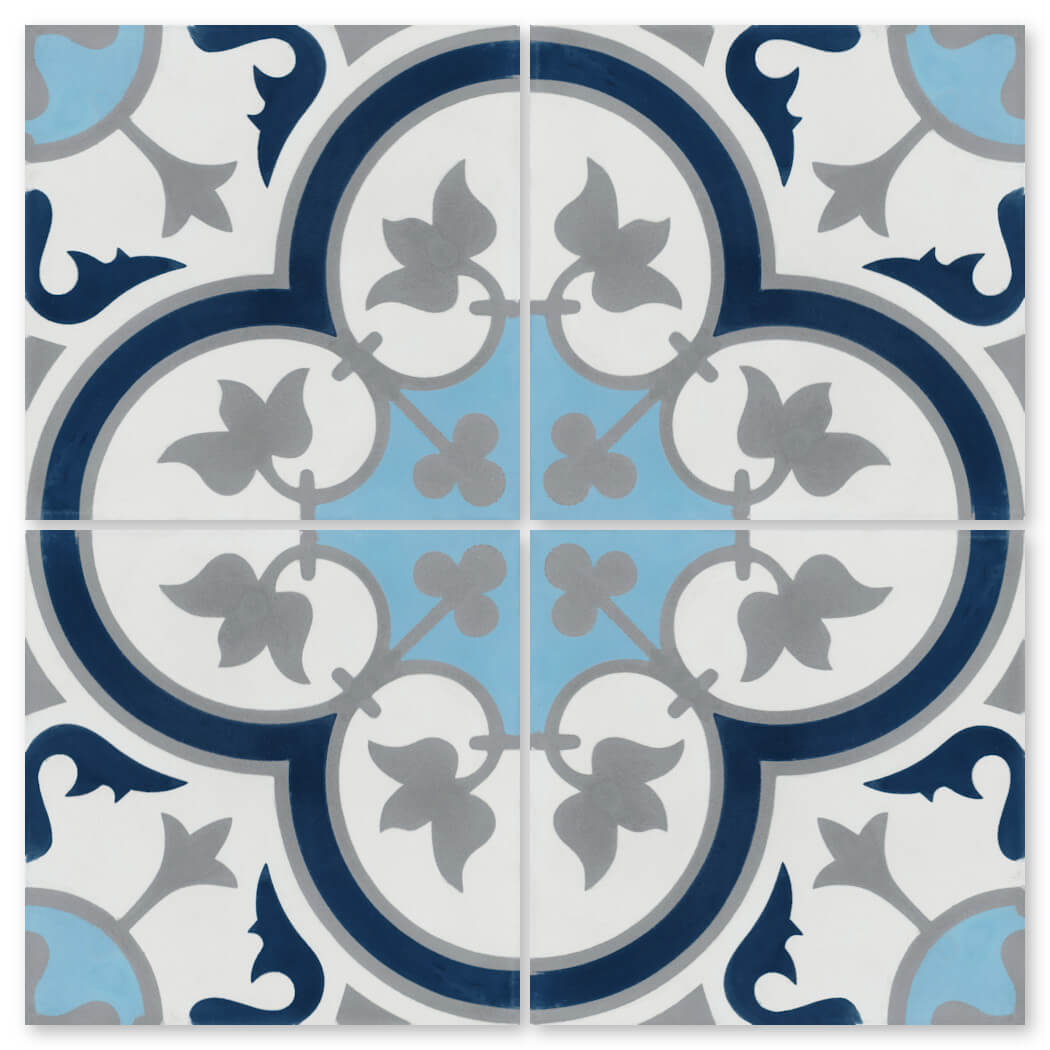 The N20-045 Ice Blue by New York Cement Tile features four tiles with a blue, gray, and black floral pattern on white.