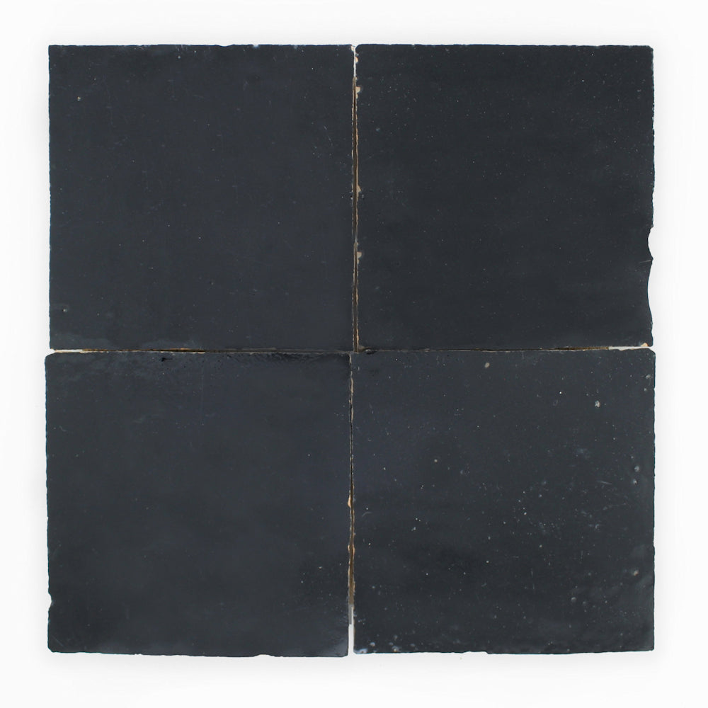 Four Black Onyx 2X2 Extra Samples by New York Cement Tile, matte black with handcrafted edges and unique imperfections.
