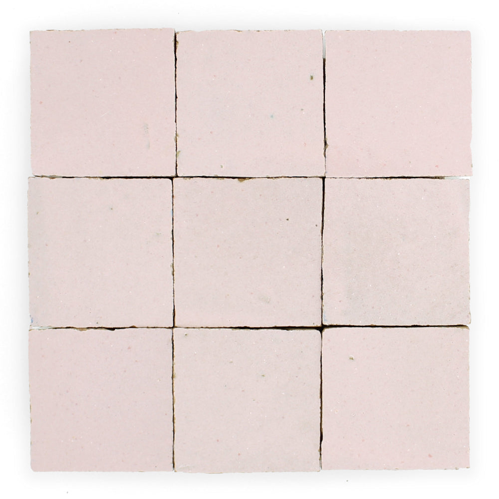 Nine Rosy Pink sample tiles from New York Cement Tile arranged in a 3x3 grid on a white background.