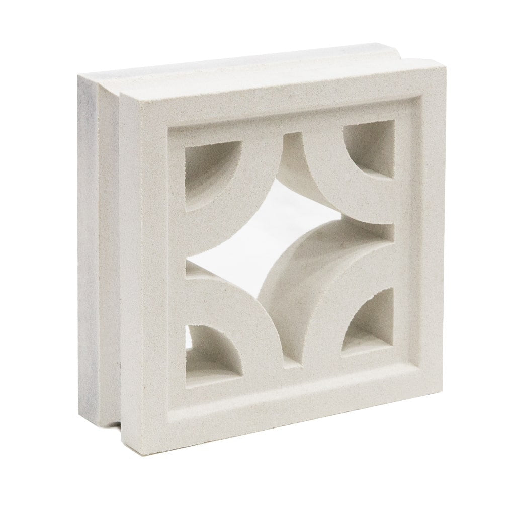 The Sam by New York Cement Tile is a white concrete breeze block with geometric cut-outs for decorative partition walls.