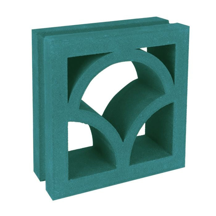 Shelli by New York Cement Tile is a green breeze block with arches and square cutouts, ideal for mid-century modern style.