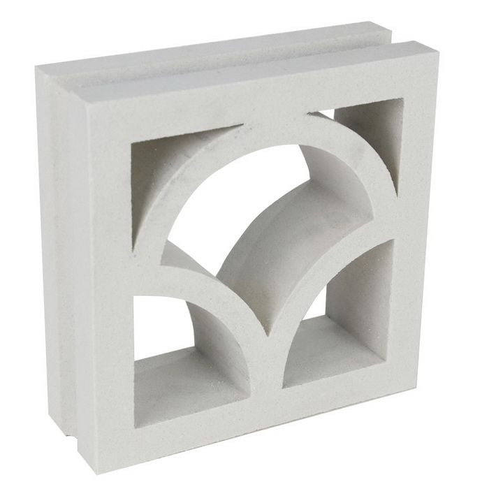 Shelli by New York Cement Tile: a white breeze block with geometric arches, ideal for mid-century modern style.