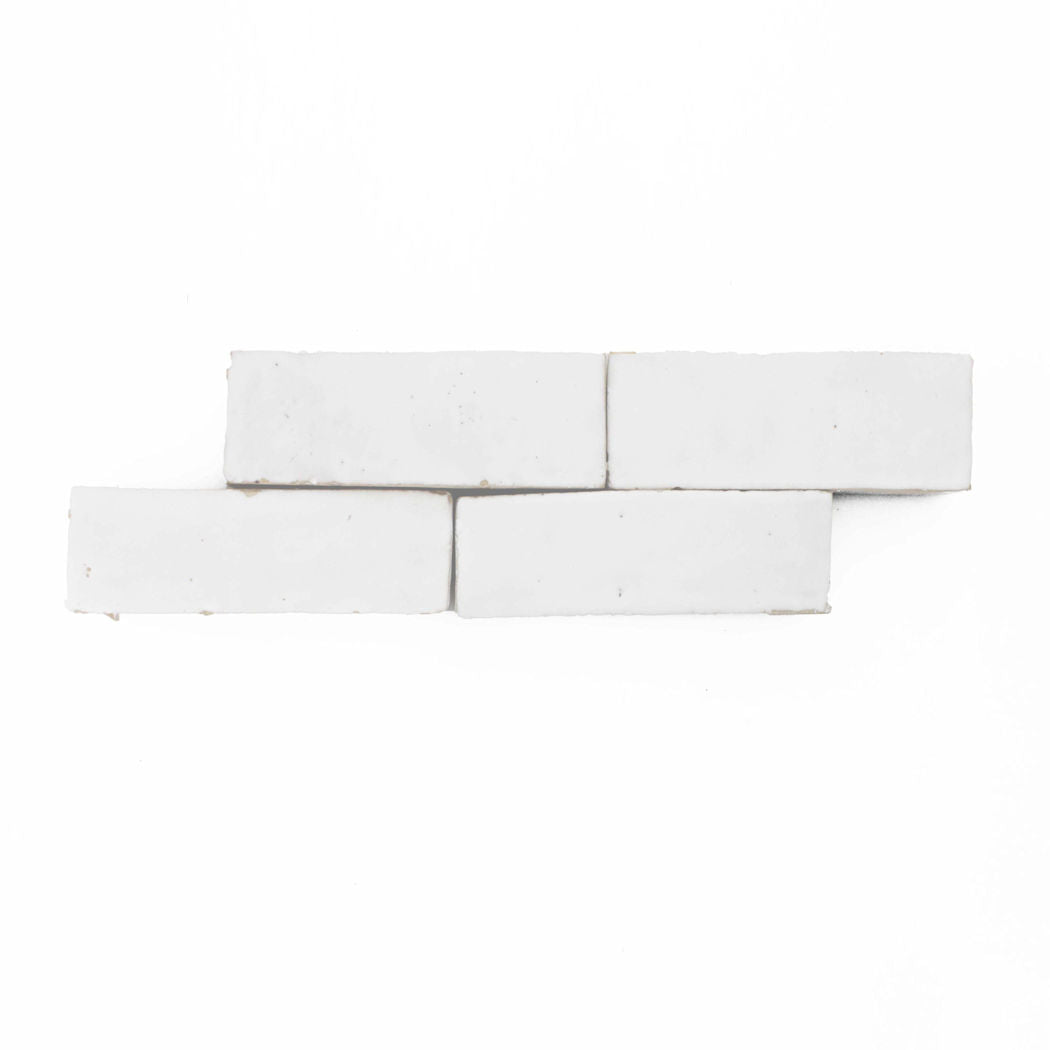 Five Frost (2x6) sample tiles by New York Cement Tile arranged in two staggered rows on a plain white background.