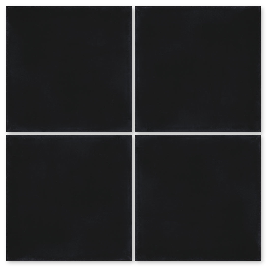 The 2200-Solid Black 4x4 sample by New York Cement Tile offers durable black tiles with thin white grid lines.