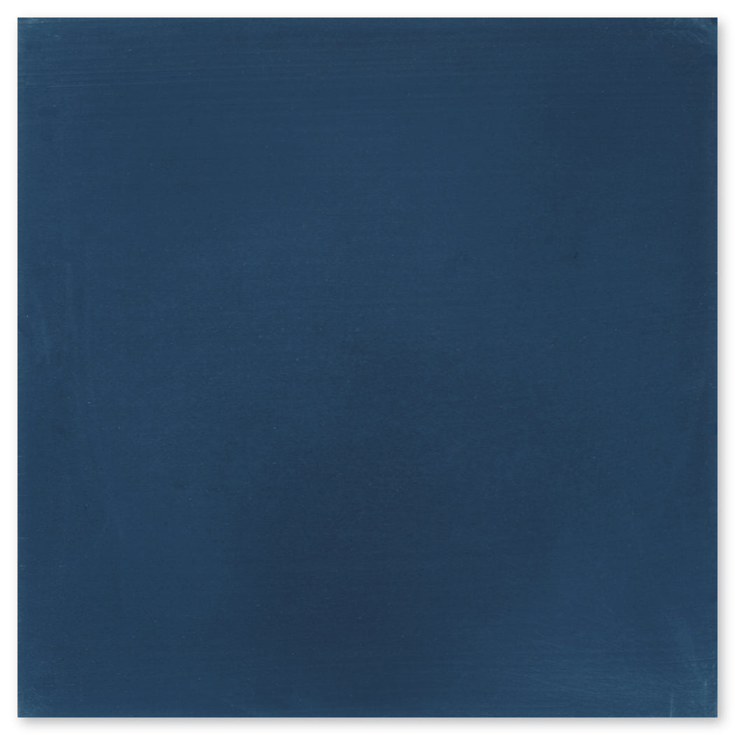 The 4412-Solid 4x4 Extra Sample by New York Cement Tile features a smooth, dark blue surface for stylish floors.