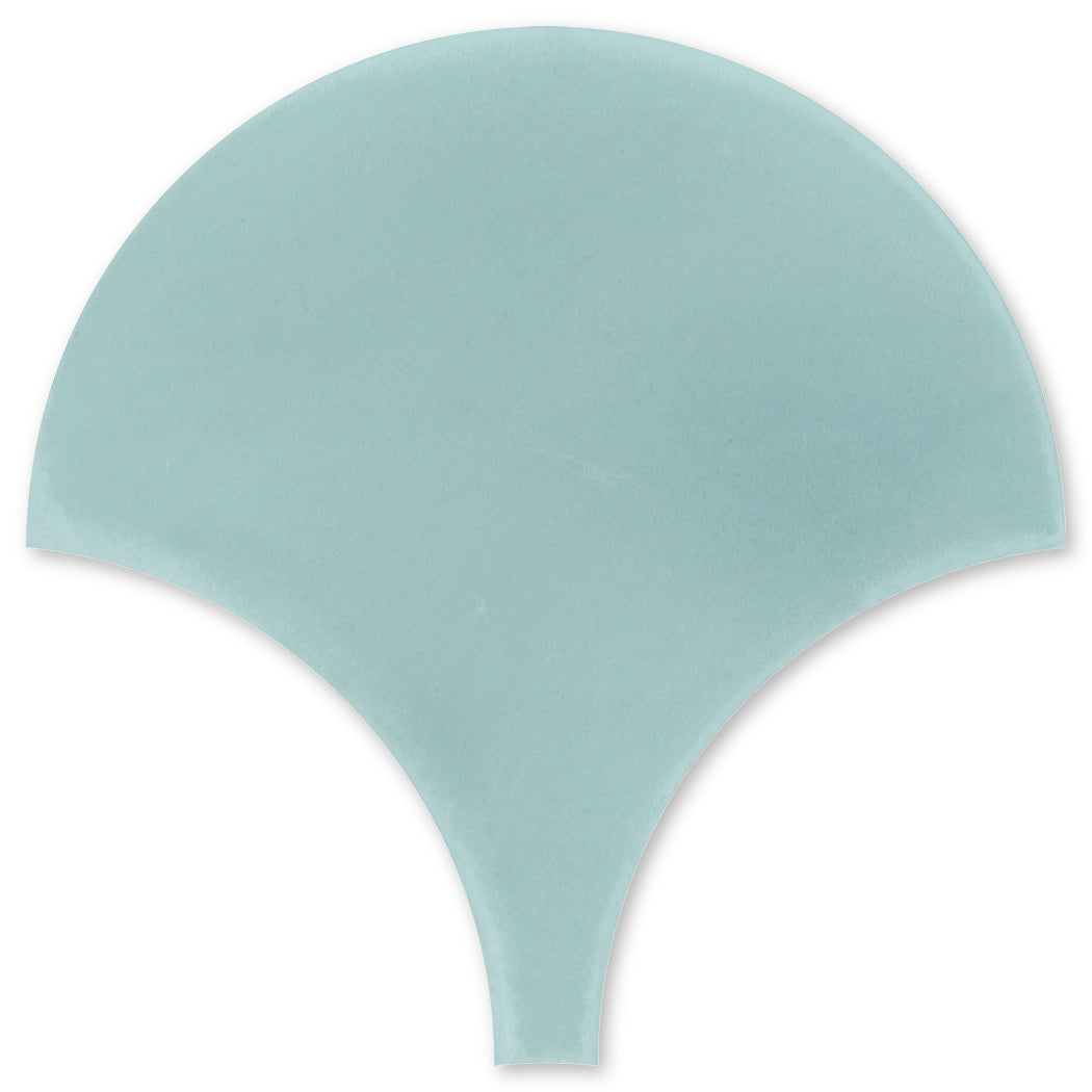The NF20-4402 Velvet Fishscale Extra Sample by New York Cement Tile in light blue, shaped like a ginkgo leaf, on white.