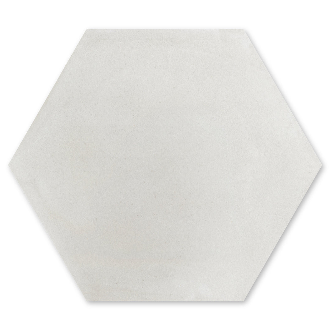 Solid Hex -Mixed Grey by New York Cement Tile: a light gray hexagon tile with a smooth, matte finish.