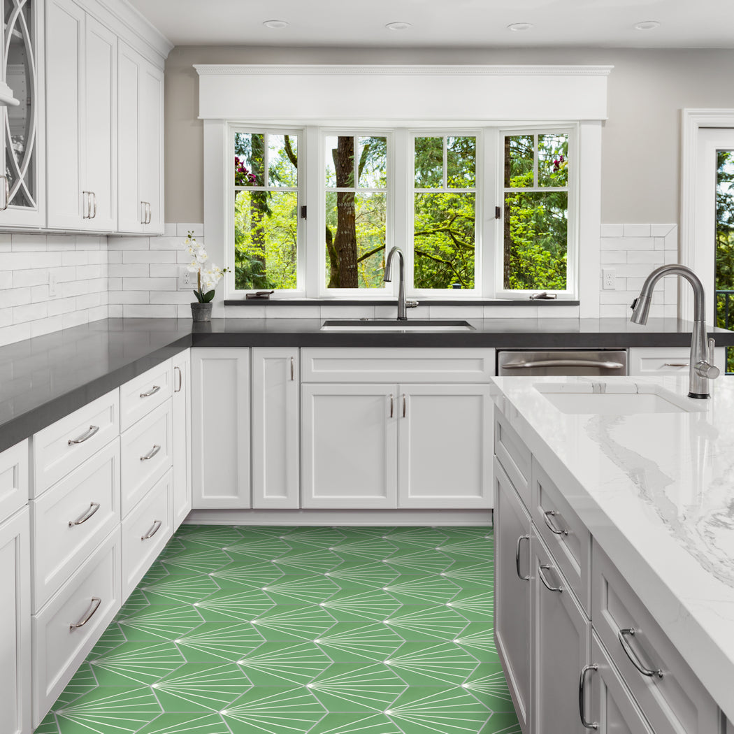 Bright kitchen with white cabinets, dark counters, big windows, and a New York Cement Tile NH23-036 green floor.