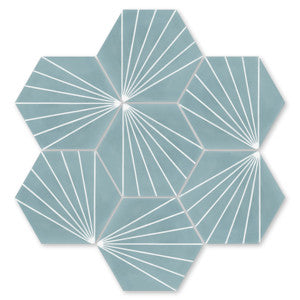 Six blue hexagonal NH23-036 - 4401 tiles by New York Cement Tile form a geometric, flower-like pattern.