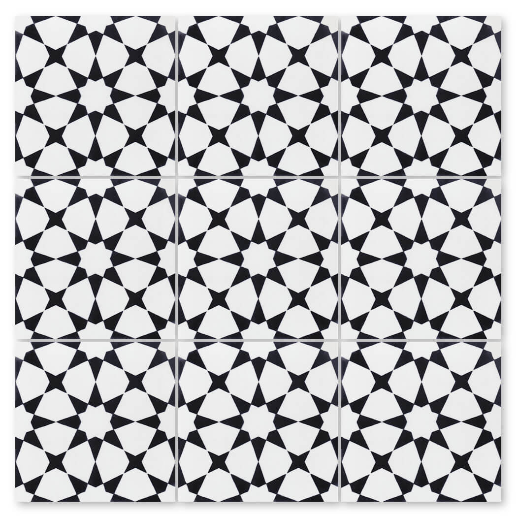 The N20-271 White & Black by New York Cement Tile features nine black and white tiles with a geometric, star-like pattern.