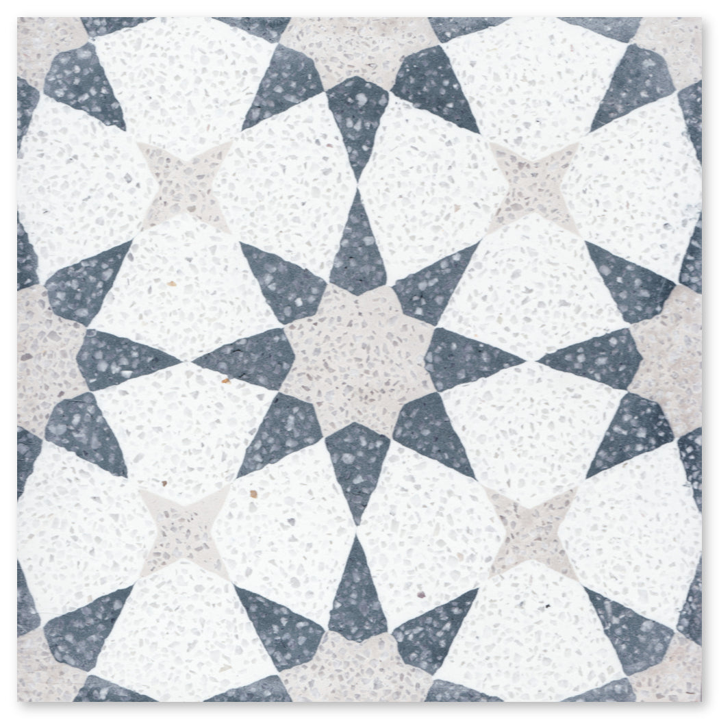 Geometric tile pattern with white, gray, and speckled shapes forming a symmetrical, repeating star design.