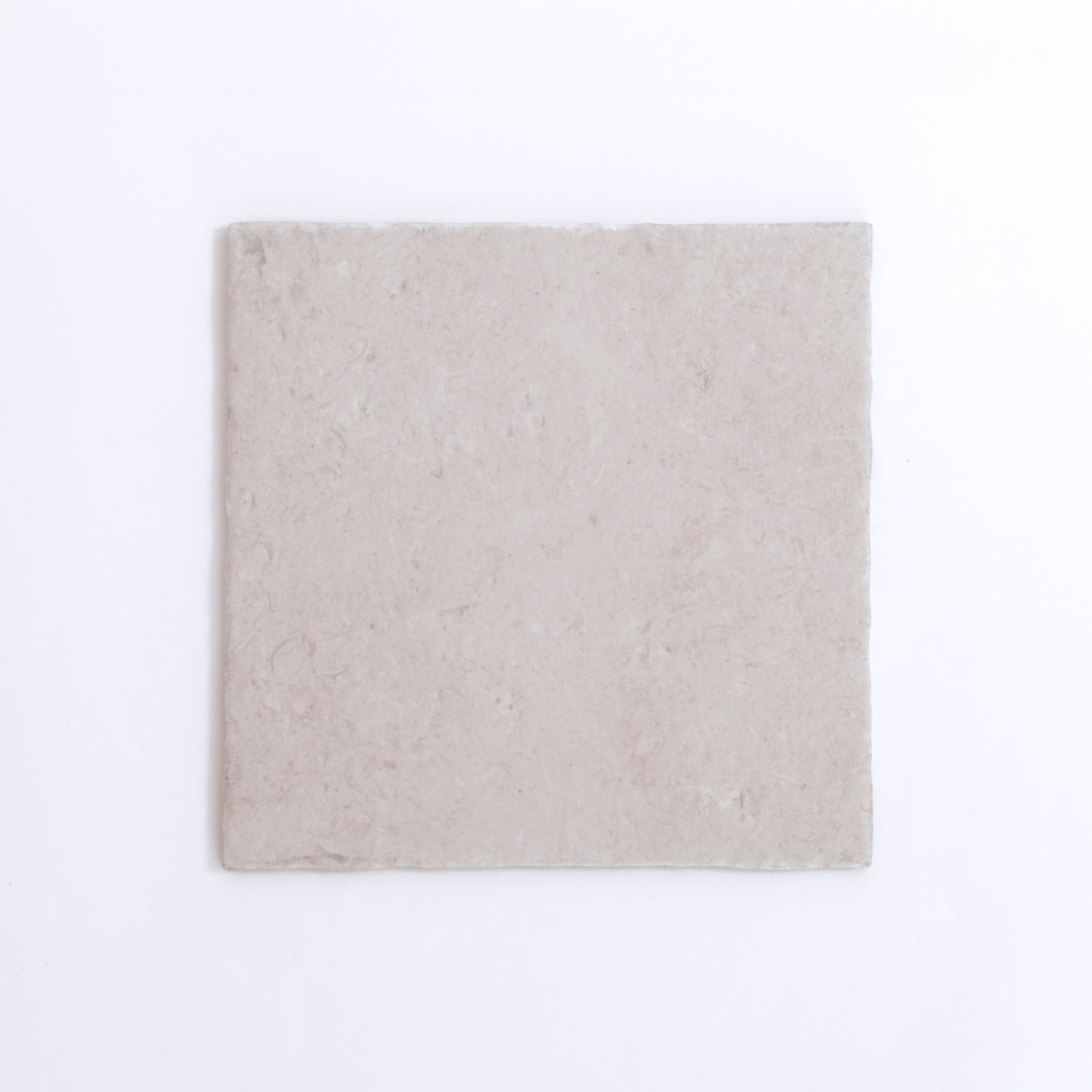 A single Toba Multicolor R11 tile by New York Cement Tile, featuring a subtle textured surface on white background.