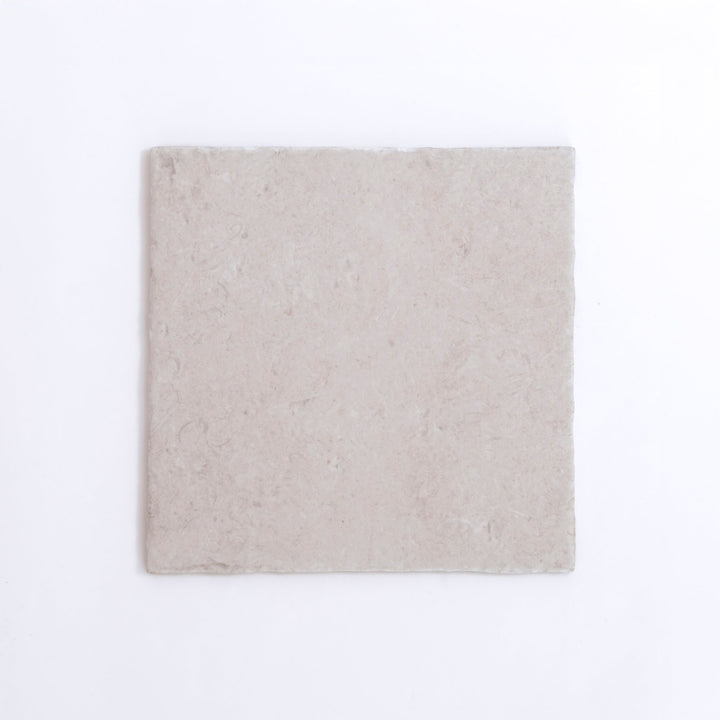 A single Toba Multicolor R11 tile by New York Cement Tile, featuring a subtle textured surface on white background.