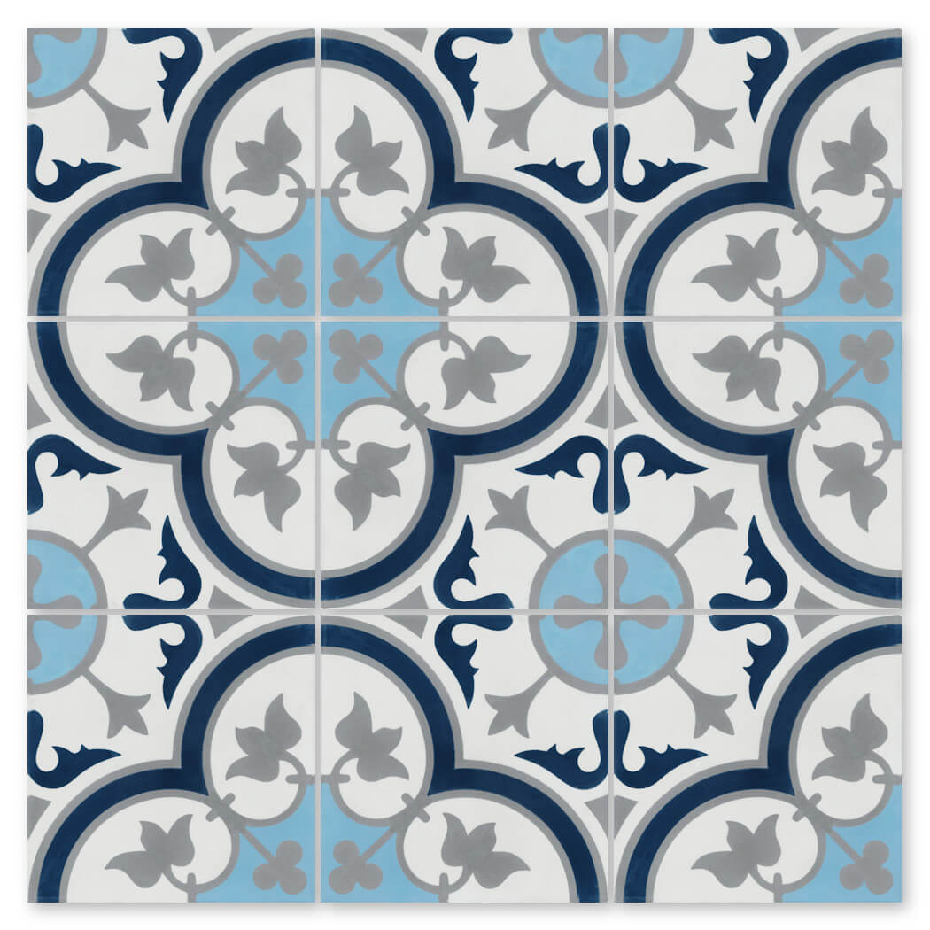 N20-045 Ice Blue by New York Cement Tile: blue, gray, navy tiles in a floral geometric pattern with curves and symmetry.