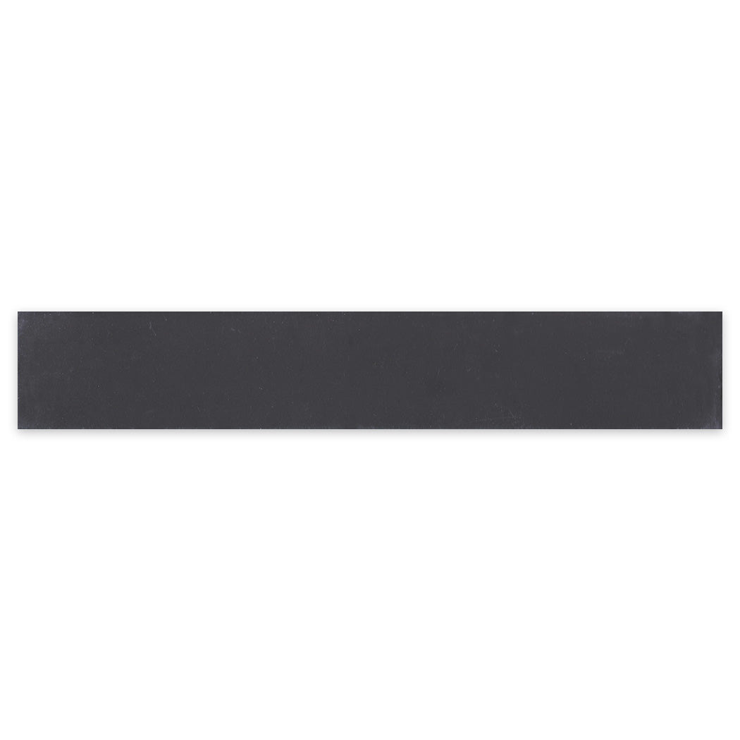 2x12 Solid Black, Extra Sample by New York Cement Tile—a long, flat black strip on a white background.