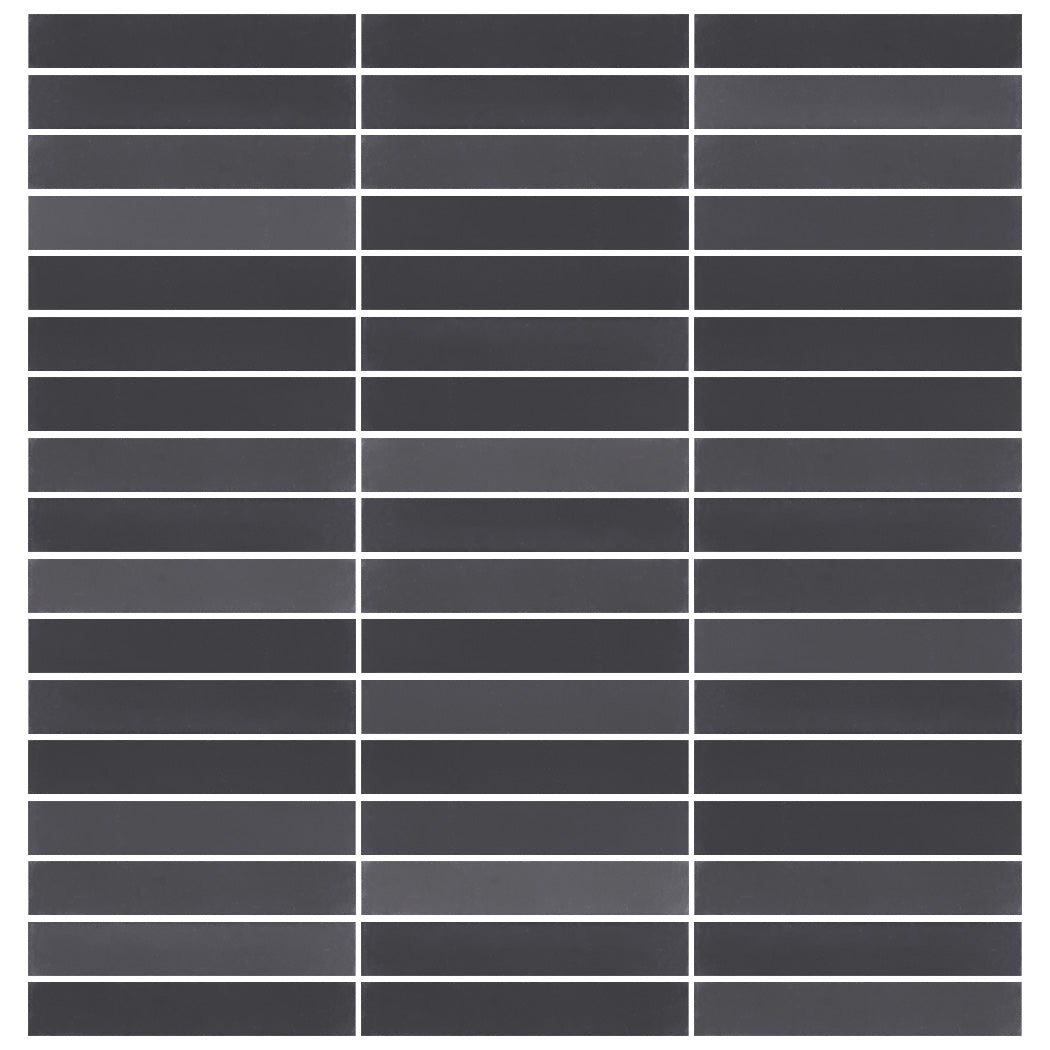 A grid of 2x12 Solid Black tiles by New York Cement Tile, with thin white lines separating each dark rectangular tile.