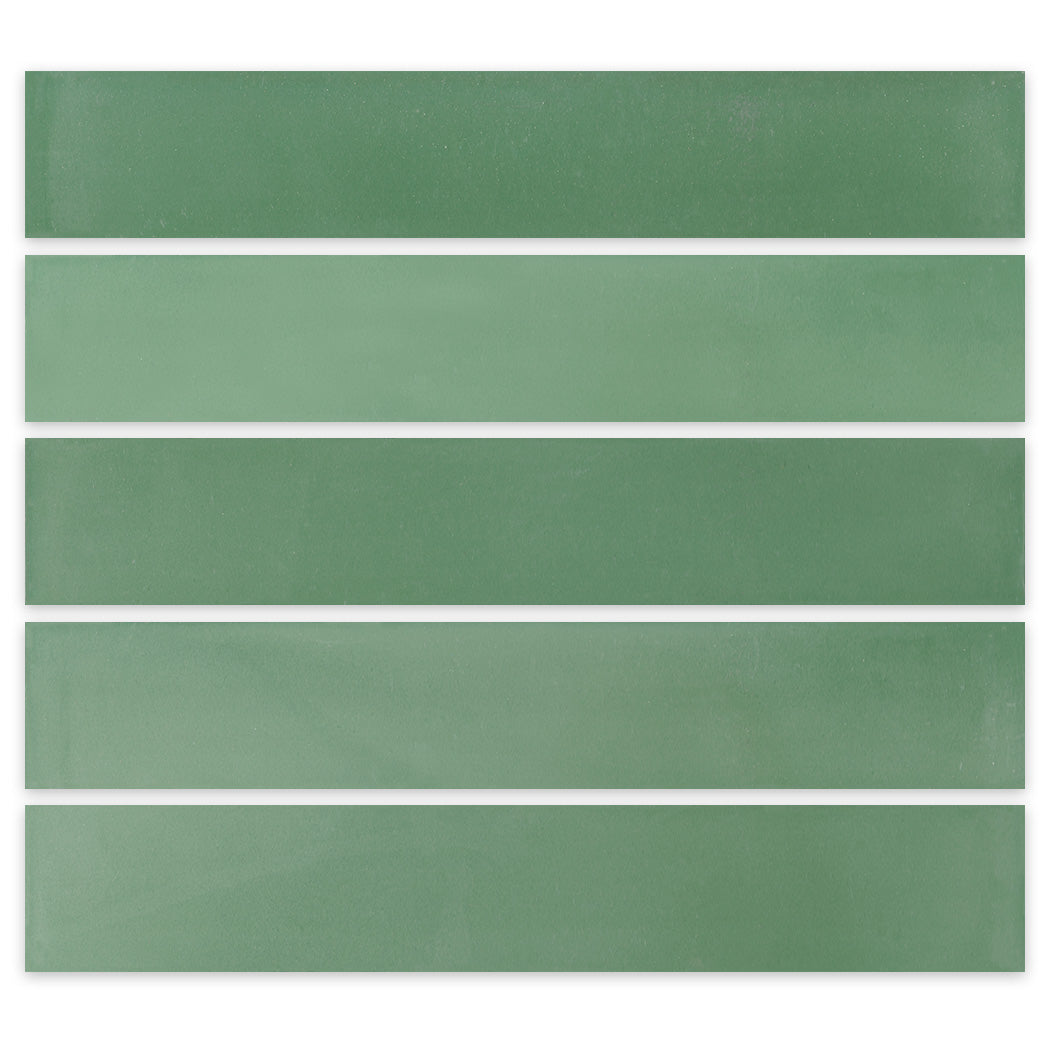 Five 2X12-Solid Gemstone Green tiles by New York Cement Tile arranged in parallel rows on a white background.