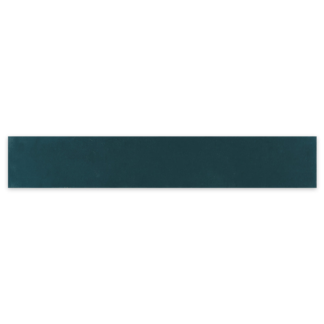The 2X12-Solid Aegean tile sample by New York Cement Tile is dark teal, rectangular, and smooth on a white background.