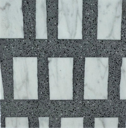 Rectangular white marble tiles are set in a grid with Carlo Scarpa- Dark Gray grout by New York Cement Tile.