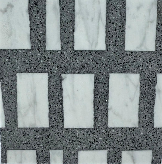 Rectangular white marble tiles are set in a grid with Carlo Scarpa- Dark Gray grout by New York Cement Tile.