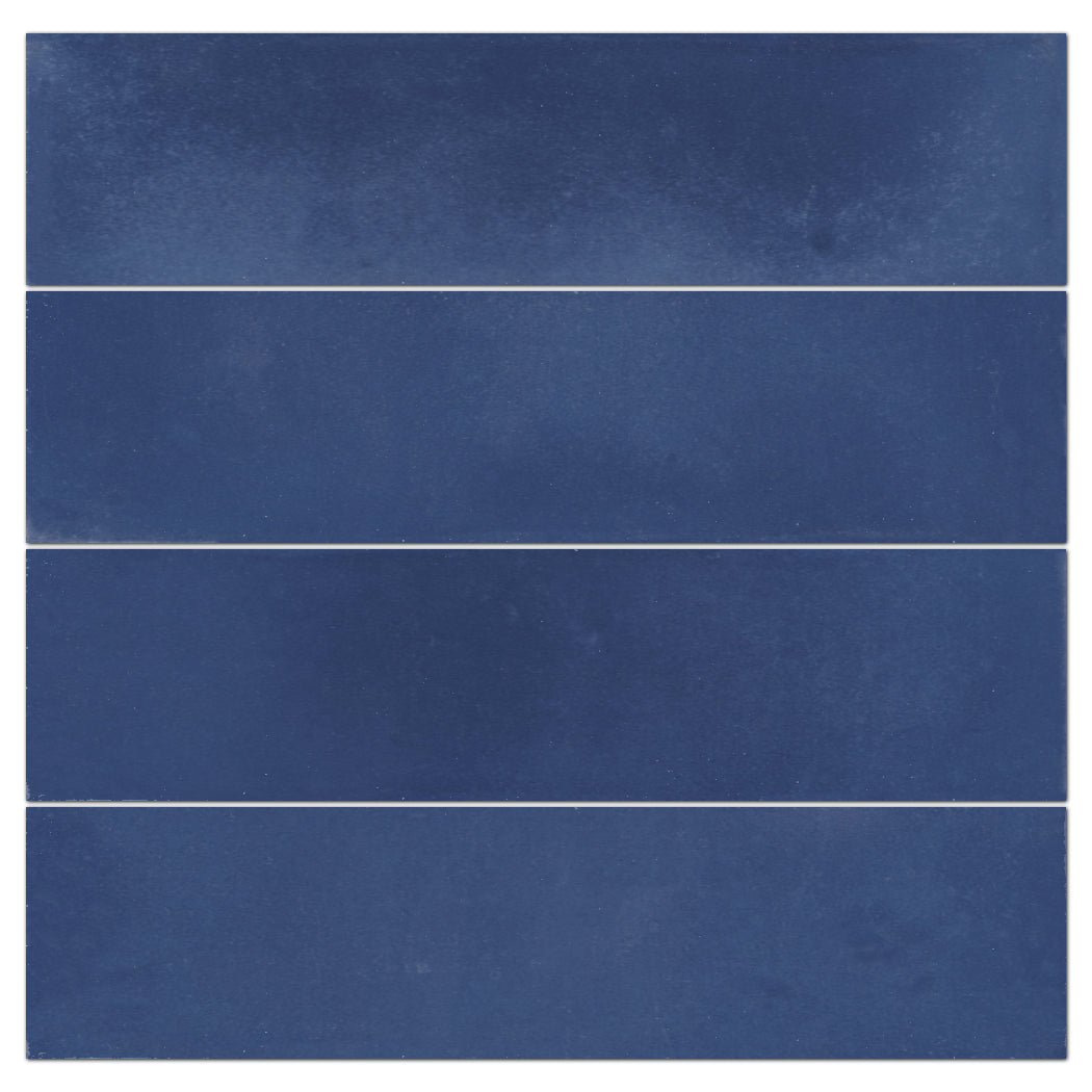 Four 2x8 Solid Admiral tiles by New York Cement Tile are stacked vertically with thin white grout lines.