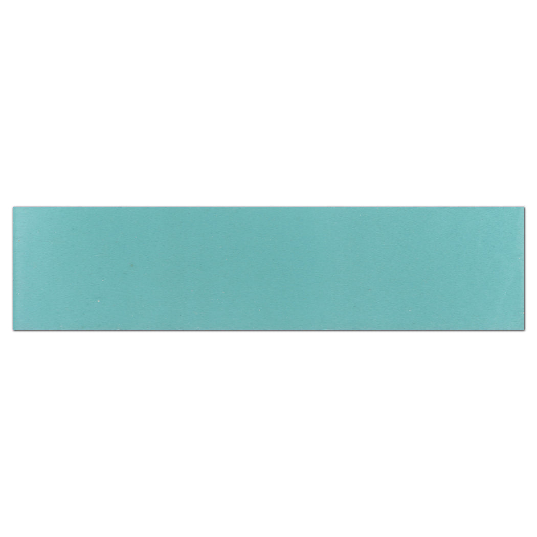 The 2X8-Solid Coastal Sky tile by New York Cement Tile is a turquoise, flat cement sample—ideal for accent walls or backsplashes.