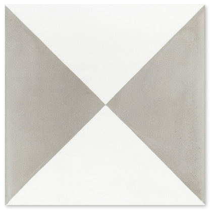 The N20-032 Grey & White tile by New York Cement Tile features grey triangles on white—stylish and durable for flooring.