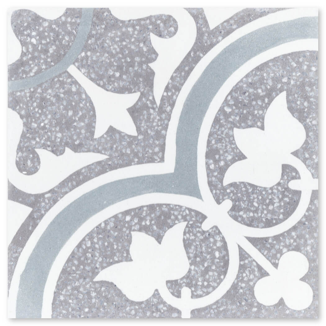 NT20-045 Holland Grey by New York Cement Tile: gray and white terrazzo tiles with floral and vine patterns on a speckled background.