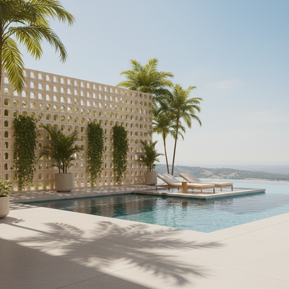 Modern pool area with lounge chairs, plants, and a geometric wall.