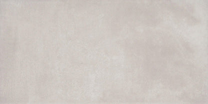 Crystal - Cosmopolitan sample by New York Cement Tile: light gray, matte finish, modern brushed concrete look.